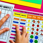 **

A child's hands are filling a sticker chart. Some stickers are rewards for reading books and doing homework. The child looks happy and motivated. Background is a colorful room, with toys and books.

**